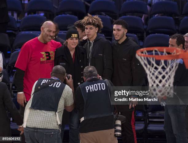 LaVar Ball with his wife Tina Ball and their sons LiAngelo Ball and LaMelo Ball attend the game between the Los Angeles Lakers and the New York...