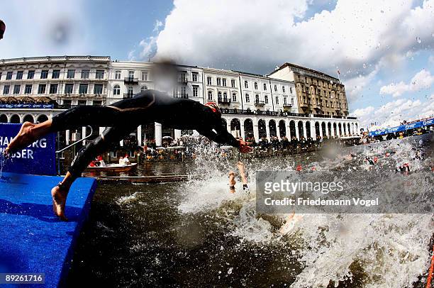 The athletes jump in the Alster during the Men's Dextro Energy Triathlon ITU World Championship on July 26, 2009 in Hamburg, Germany.