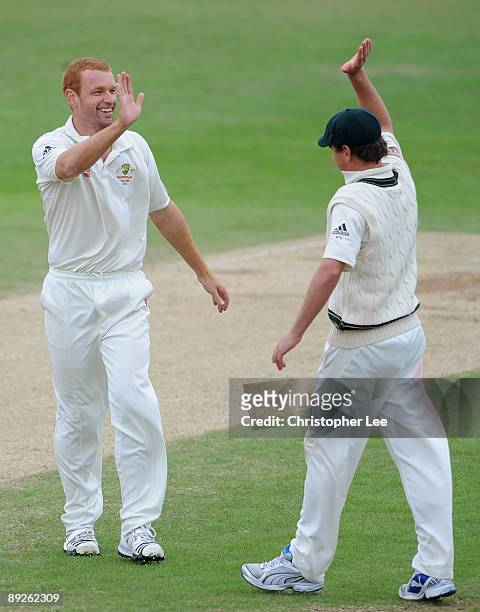 Andrew McDonald of Australia is congratulated by team mates after taking the wicket of Ben Howgego of Northamptonshire during Day 3 of the...