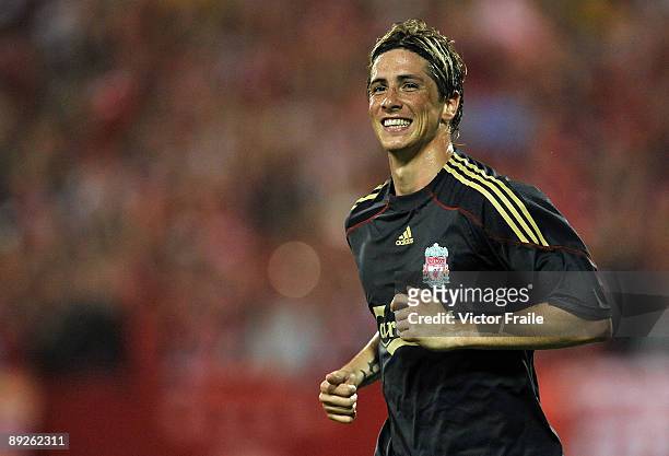Fernando Torres of Liverpool celebrates after scoring against Singapore during their pre-season friendly soccer match at the National Stadium, July...