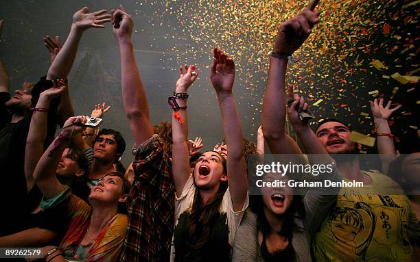 The crowd enjoy the show put on by the Flaming Lips during the Splendour in the Grass festival at Belongil Fields on July 26, 2009 in Byron Bay,...