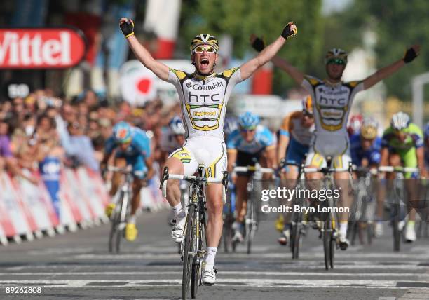 Mark Cavendish of Great Britain and Team Columbia-HTC crosses the finish line to win Stage Twenty One of the Tour de France on July 26, 2009 in...