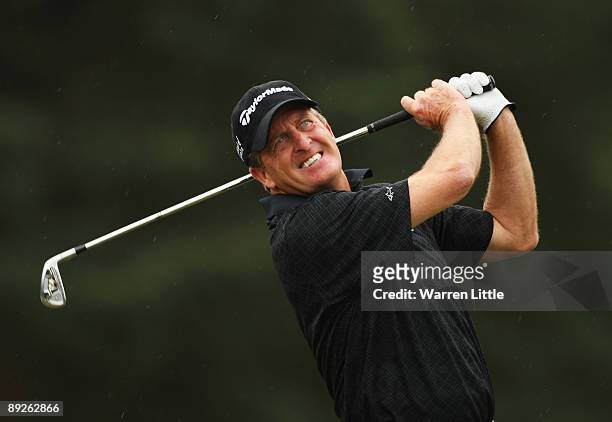 Fred Funk of the USA plays his second shot into the second green during the final round of The Senior Open Championship presented by MasterCard held...