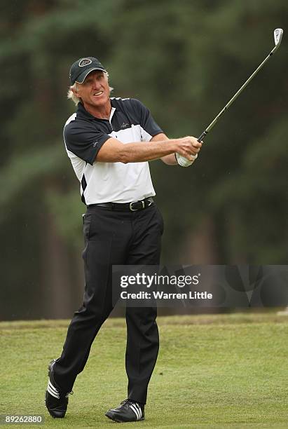 Greg Norman of Australia plays his second shot into the second green during the final round of The Senior Open Championship presented by MasterCard...