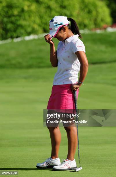 Ai Miyazato of Japan celebrates winning on the first playoff hole, the 18th, against Sofie Gustafson of Sweden after the final round of the Evian...
