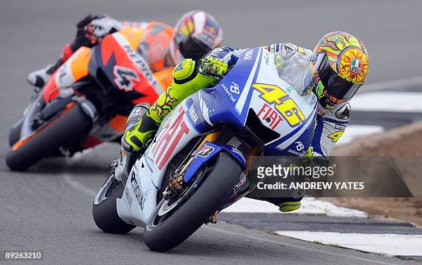 Valentino Rossi of Italy leads Andrea Dovizioso of Italy at Donington Park, in Leicestershire, central England, on July 26, 2009. Dovizioso won ahead...