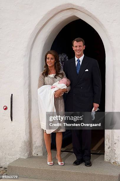 Prince Joachim and Princess Marie present their newly Christened Prince Henrik Carl Joachim Alain of Denmark at Mogeltonder Church on July 26, 2009...