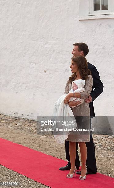 Prince Joachim and Princess Marie arrives for attends for the Christening of Prince Hein Carl Joachim Alain of Denmark at Mogeltonder Church on July...
