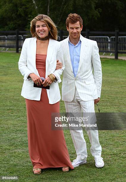 Amber Nuttall and Tom Aikens attends the Cartier International Polo Day at Guards Polo Club on July 26, 2009 in Egham, England.