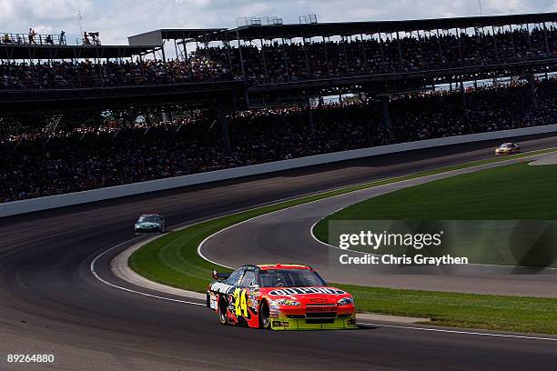 Jeff Gordon, driver of the DuPont Chevrolet, drives during the NASCAR Sprint Cup Series Allstate 400 at the Brickyard at Indianapolis Motor Speedway...