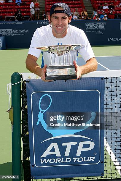 Robby Ginepri poses for photographers after defeating Sam Querrey during the final of the Indianapolis Tennis Championships on July 26, 2009 at the...