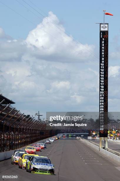 Jimmie Johnson, driver of the Lowe's/KOBALT Tools Chevrolet, leads a group of cars during the NASCAR Sprint Cup Series Allstate 400 at the Brickyard...