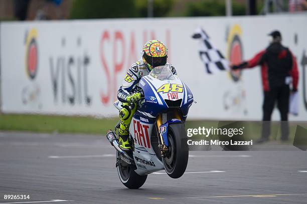 Valentino Rossi of Italy and Fiat Yamaha Team cuts the finish line the MotoGp race of the British MotoGP, at Donington Park Circuit on July 26, 2009...