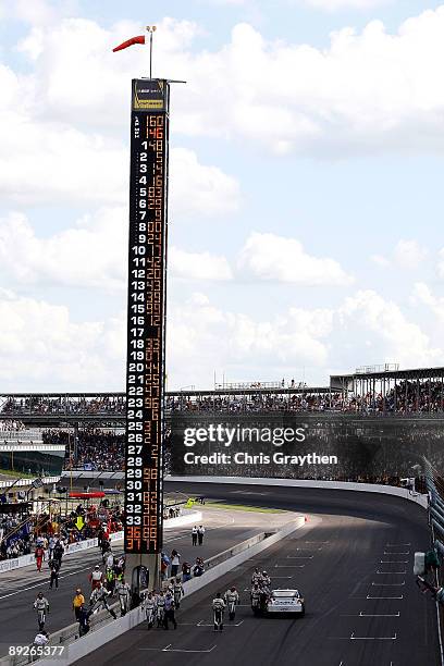 Jimmie Johnson, driver of the Lowe's/KOBALT Tools Chevrolet, celebrates with his crew members after winning the NASCAR Sprint Cup Series Allstate 400...