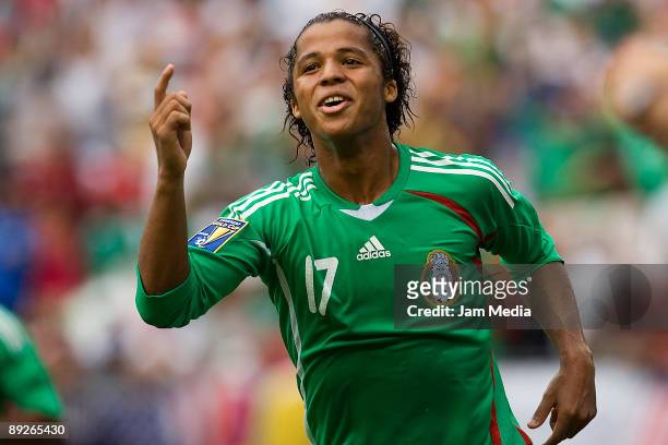 Mexico's player Giovani dos Santos celebrates a scored goal during the CONCACAF Gold Cup final match against USA at the Giant Stadium on July 26,...