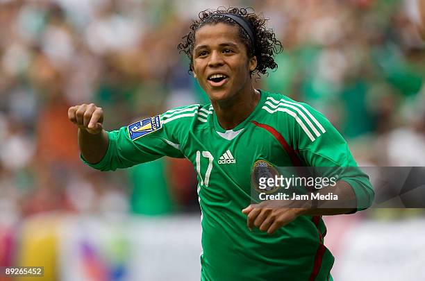Mexico's player Giovani dos Santos celebrates a scored goal during the CONCACAF Gold Cup final match against USA at the Giant Stadium on July 26,...