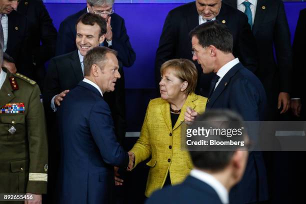Emmanuel Macron, France's president, left, Donald Tusk, president of the European Union , second left, Angela Merkel, Germany's chancellor, center,...