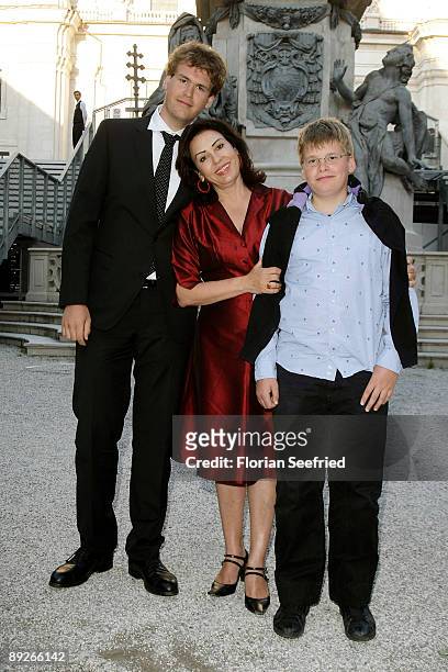 Brigitte Karnar and her sons Benedikt and Kaspar leave the premiere of 'Everyman' during the Salzburg Festival at Domplatz on July 26, 2009 in...