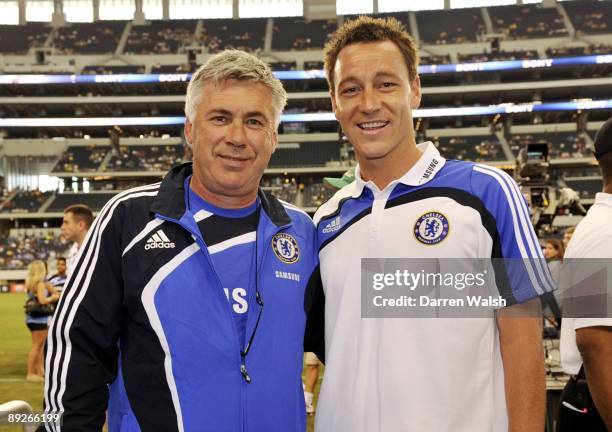 Manager Carlo Ancelotti of Chelsea stands with player John Terry after Terry commited to play with Chelsea prior to the match agaginst Club America...