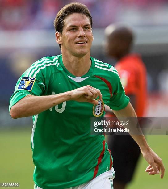 Mexico's player Guillermo Franco celebrates a scored goal during the CONCACAF Gold Cup final match against USA at the Giant Stadium on July 26, 2009...