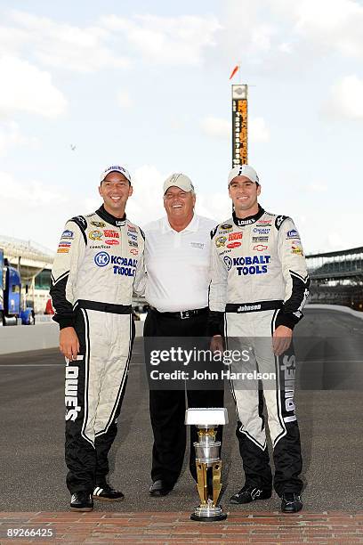 Crew chief Chad Knaus, team owner Rick Hendrick and driver Jimmie Johnson, driver of the Lowe's/KOBALT Tools Chevrolet, celebrates after winning the...