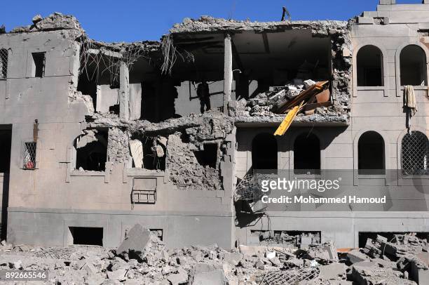 Soldier stands in a building of the prison destroyed by airstrikes on December 13, 2017 in Sana’a, Yemen. More than 12 prisoners killed and 80 others...