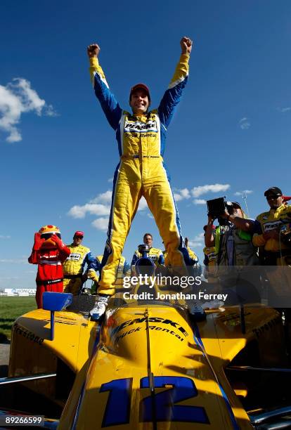 Will Power, driver of the Penske Truck Rental Dallara Honda, celebrates after winning the IRL IndyCar Series Rexall Edmonton Indy on July 26, 2009 at...