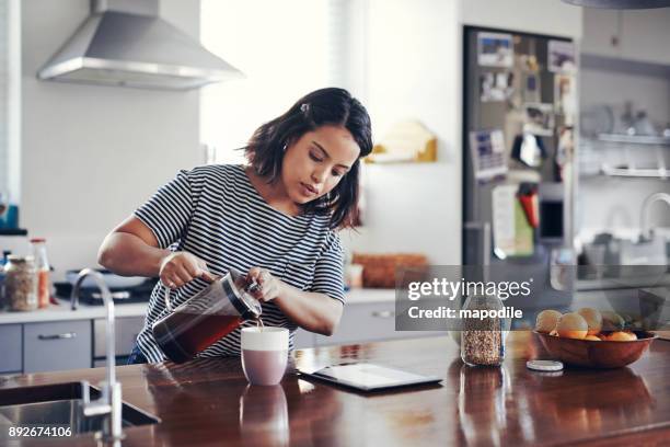 today's breakfast is a fresh brew with a side of browsing - coffee maker stock pictures, royalty-free photos & images