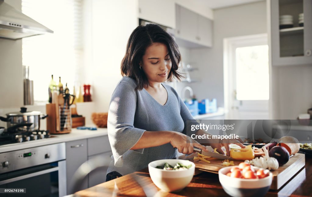 Preparing her favourite dish