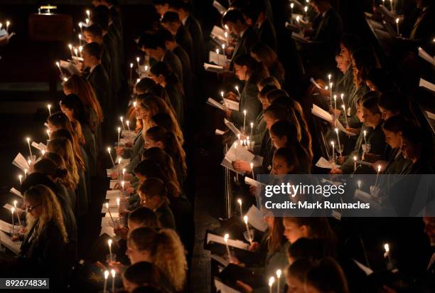 Pupils at Glenalmond College take part in its annual Candlelit Service in the school's Gothic Chapel on December 14, 2017 in Perth, Scotland. The...