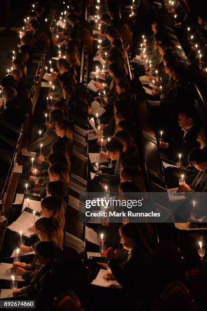 Pupils at Glenalmond College take part in its annual Candlelit Service in the school's Gothic Chapel on December 14, 2017 in Perth, Scotland. The...