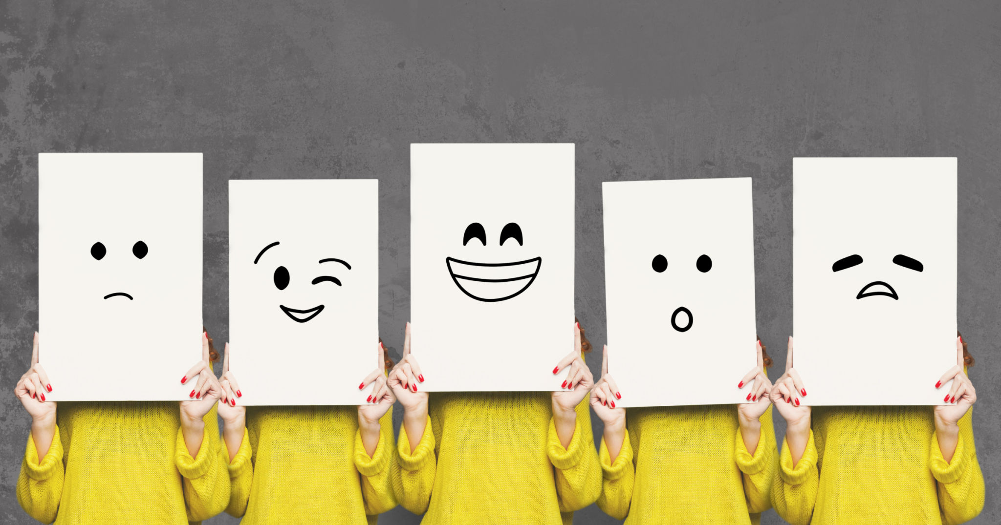 Girl covering face with white boards. Set of painted emotions Girl covering face with white boards. Set of painted emotions