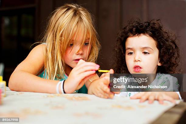 young girls painting nails - 4 girls finger painting bildbanksfoton och bilder