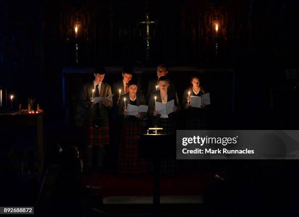 Pupils at Glenalmond College take part in its annual Candlelit Service in the school's Gothic Chapel on December 14, 2017 in Perth, Scotland. The...