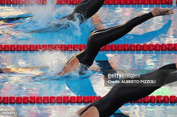 Britain's Joanne Jackson, Italy's Federica Pellegrini and US Allison Schmitt compete during the final of the Women's 400m freestyle on July 26, 2009...