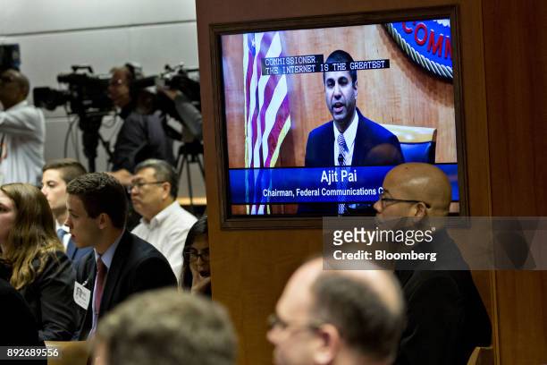 Ajit Pai, chairman of the Federal Communications Commission , is displayed on a monitor while speaking during an open commission meeting in...
