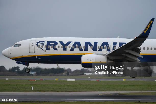 Ryanair plane is about to land on the runway at Dublin airport. Passengers are facing severe travel disruption after Ryanair pilots in Ireland,...