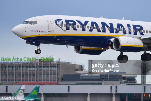 Ryanair plane is about to land on the runway at Dublin airport. Passengers are facing severe travel disruption after Ryanair pilots in Ireland,...