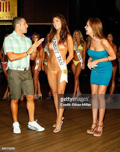 Comedian Josh Nasar and Miss Sunset Tan 2008 Bambi Lashell ask contestant Michelle Cooper of North Carolina a question during the second annual Miss...