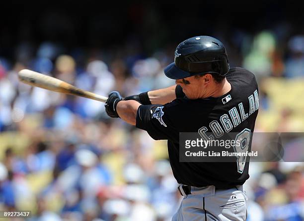 Chris Coghlan of the Florida Marlins hits a RBI double in the fourth inning against the Los Angeles Dodgers at Dodger Stadium on July 26, 2009 in Los...