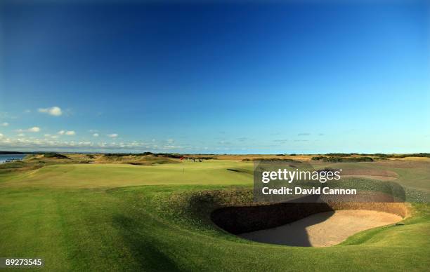 View from behind and left of the green on the par 3, 11th hole with the green of the par 4, 7th hole behind on the Old Course on July 11, 2009 in St...