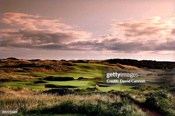 The par 3, 11th hole 'Feather Bed' in the foreground with the par 4, 15th hole 'Purgatory' behind on the Dunluce Course at Royal Portrush Golf Club...