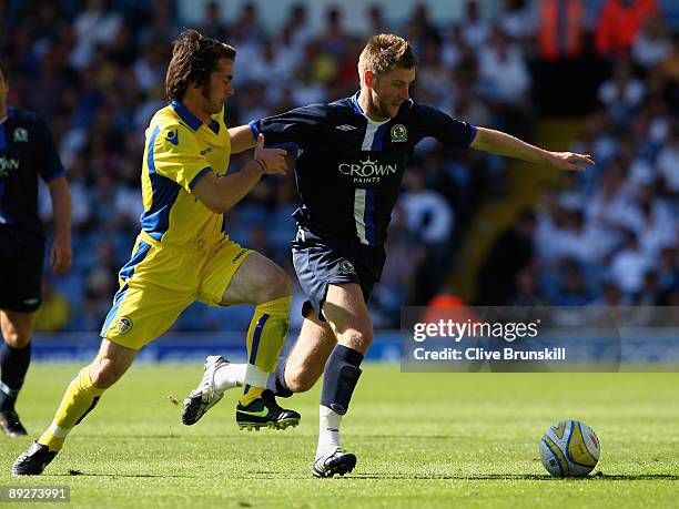 Paul Gallagher of Blackburn Rovers in action with David Prutton of Leed United during the Pre Season Friendly match between Leeds United and...