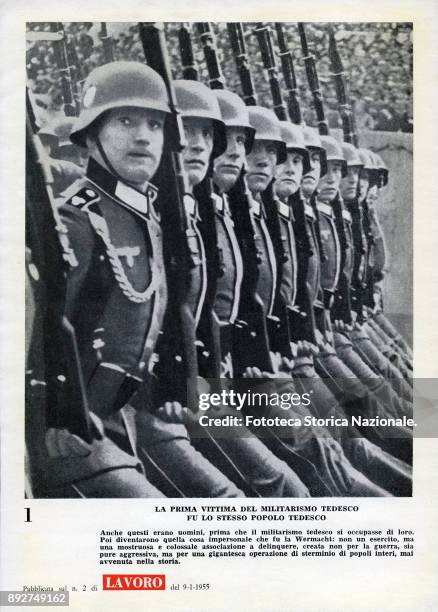 'Lest we forget', page 1, a parade of Nazi soldiers with title 'The first victim of German militarism was the same German people'. Pamphlet created...