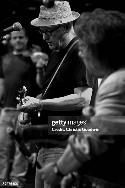 Adrian Edmondson of The Bad Shepherds performs on stage at Rochester Castle on July 15, 2009 in Rochester, England.