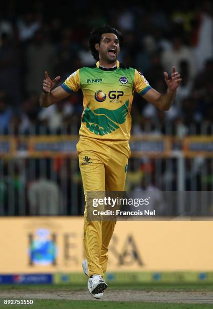 Mohammad Irfan of Pakhtoons celebrates after dismissing Kamran Akmal of Maratha Arabians during the T10 League match between Maratha Arabians and...