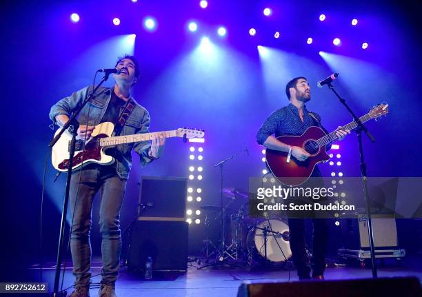 Singers Chuck Criss and Darren Criss of the band Computer Games perform onstage at The Fonda Theatre on December 13, 2017 in Los Angeles, California.