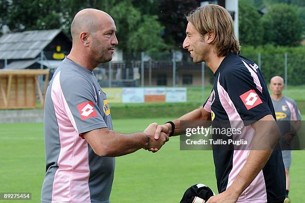 New goalkeeper of Palermo Giacomo Breichetto meets coach Walter Zenga during a training session at Sportarena on July 24, 2009 in Bad Kleinkirchheim...