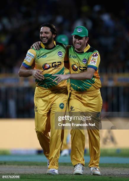 Shahid Afridi of Pakhtoons celebrates after dismissing Rilee Rossouw of Maratha Arabians during the T10 League match between Maratha Arabians and...