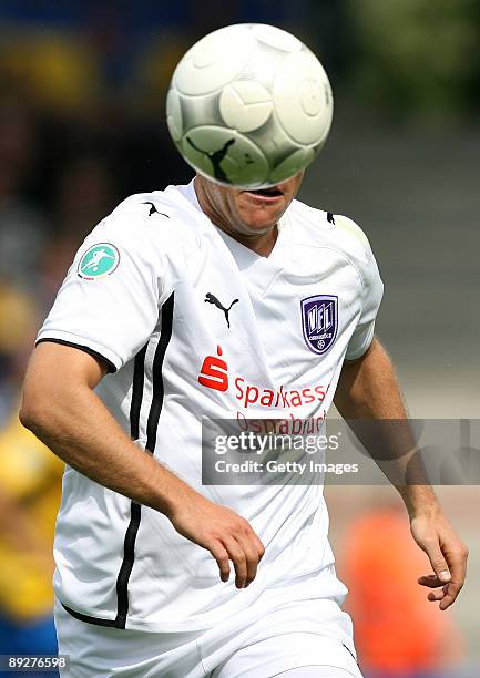 Thomas Reichenberger of Osnabrueck runs with the ball during the 3. Liga match between Eintracht Braunschweig and VfL Osnabrueck at the Eintracht...